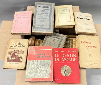 several books are stacked on top of each other on a table