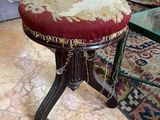 an image of a chair with a red and gold upholstered seat