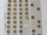 a lot of coins in a plastic bag on the table