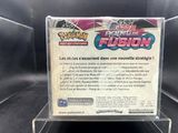 the back of a pokemon trading card on display in a glass case