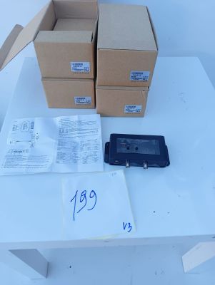 a table with boxes and a cell phone on it