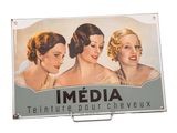 une pancarte sur laquelle est écrit « Media Tenure pour cheveux »
