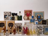 many different types of perfumes on the table