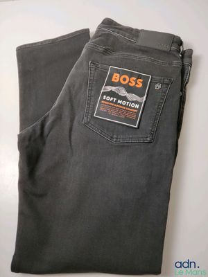 a close up of a pair of grey jeans on a table