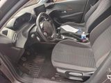 a picture of the inside of a car with a steering wheel