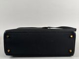 the row black leather clutch bag