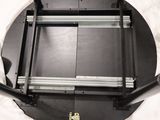 a black table with a metal frame on top of it