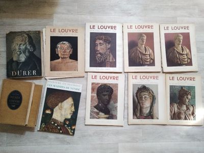 a lot of books that are on a table