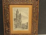 un vieux cadre contenant la photo d'une église