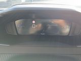 a car dashboard with a digital display on it