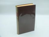 an image of a book sitting on top of a white table