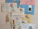 many different types of postcards on the wall