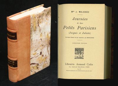 un vieux livre posé sur une table à côté d'un autre livre