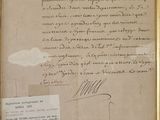 une photo d'un document manuscrit dans un cadre doré