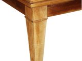 the table is made of wood and has a herring pattern on the top