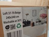 a cardboard box with a label on it that says lott 3770 being 240x340 cm washabble at 30°c