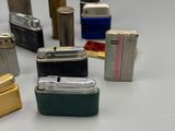 a lot of different types of lighters on the table
