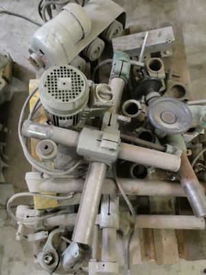 a pile of assorted metal items sitting on a pallet