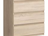 un gros plan d'une commode en bois sur fond blanc