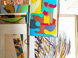 a picture of a bunch of art on the wall