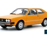 an orange model of a small car on a white background