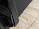 a close up of a toaster oven on a wooden table