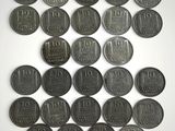 a lot of coins that are sitting on a table