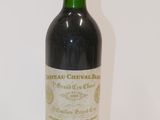a bottle of wine that is sitting on a table