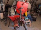 an image of a garage filled with tools and a fire hydrant