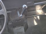 a car dashboard with a steering wheel and a dash board