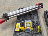 two tools that are sitting on the floor next to each other