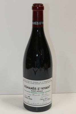 a bottle of wine that is sitting on a table