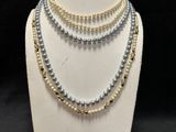 a close up of a necklace on a mannequin mannequin