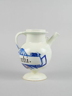a white vase with a blue and white design on it