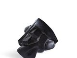 an image of a close up of a black object on a white surface