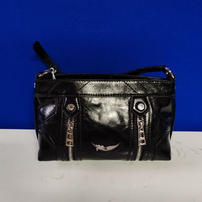 black leather purse with zippers and zippers on it