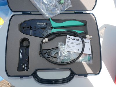 a tool set up in a case on a table