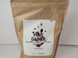 un sac de « Pure Gainer » posé sur une table