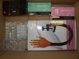 a box with a pair of gloves and a pair of gloves in it