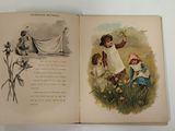 an open book with a picture of a woman and a child on it