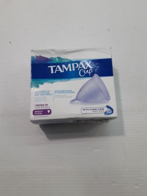 a close up of a box of tampox on a table