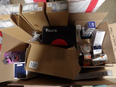 a pile of boxes that have various items in them