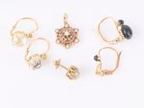a set of five pairs of earrings and rings
