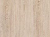 a close up view of a wooden surface with a light brown stain