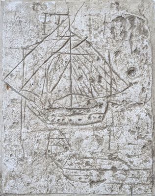 an image of a ship carved into the side of a wall