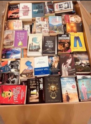 a box full of books sitting on the floor