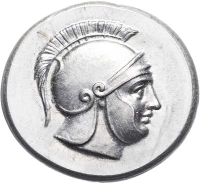 an ancient greek coin with a head of a man wearing a helmet and a feathered headdress