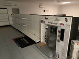 an image of a commercial kitchen with a refrigerator