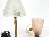 two lamps that are sitting on a table
