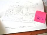 a piece of paper with a drawing of a building on it